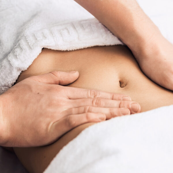 Professional massage of the abdomen.
